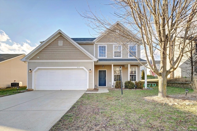 view of front facade featuring a garage, central AC, a front yard, and covered porch