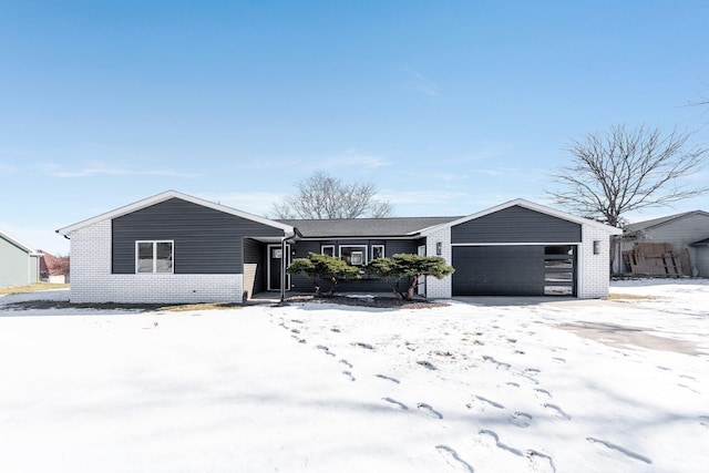 single story home with a garage