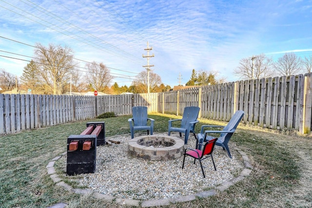 view of yard with an outdoor fire pit