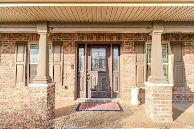 entrance to property with a porch