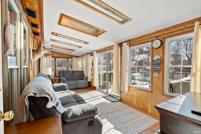 sunroom / solarium with vaulted ceiling