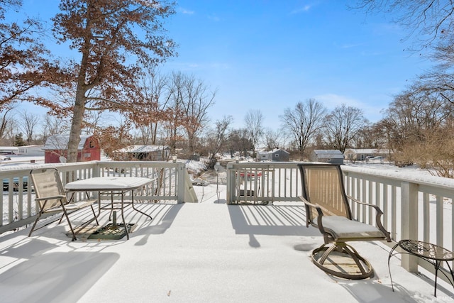 view of snow covered deck