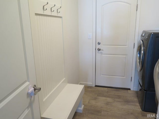 mudroom featuring washer / clothes dryer and dark hardwood / wood-style floors