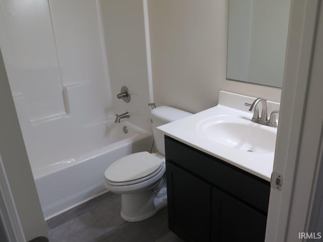 full bathroom featuring tile patterned flooring, vanity, bathtub / shower combination, and toilet