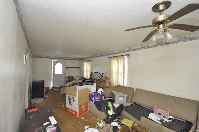 living room with a textured ceiling