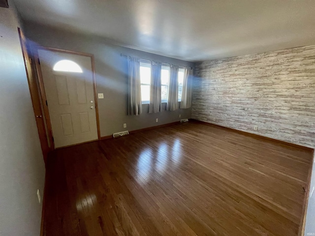 foyer featuring hardwood / wood-style floors