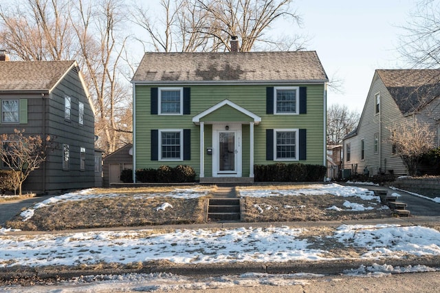 colonial-style house with central AC