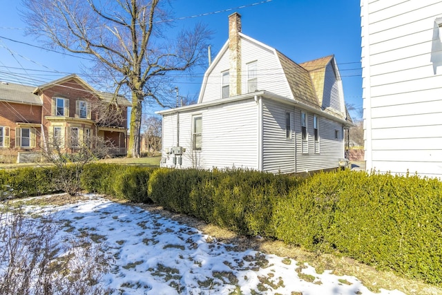 view of snow covered property