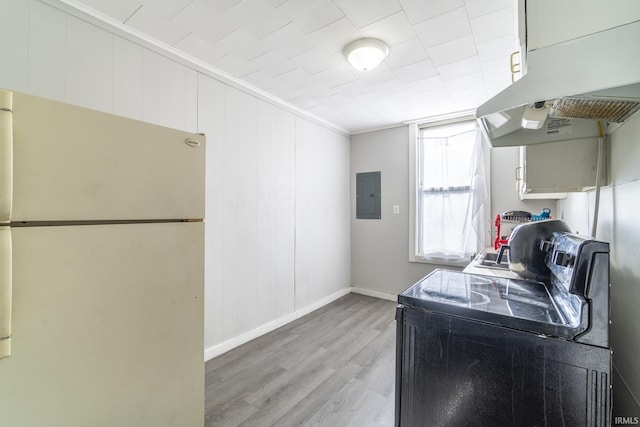 kitchen with ventilation hood, electric panel, white fridge, range with electric cooktop, and light hardwood / wood-style floors