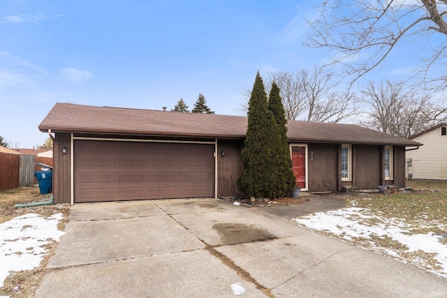 single story home featuring a garage