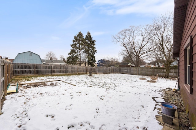 view of yard covered in snow