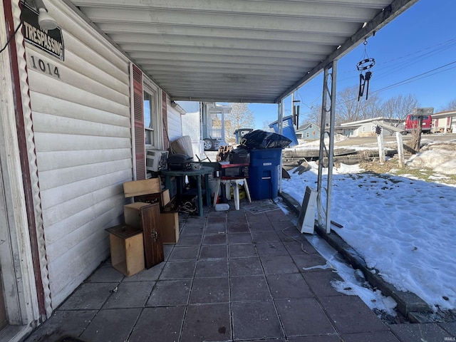 view of snow covered patio