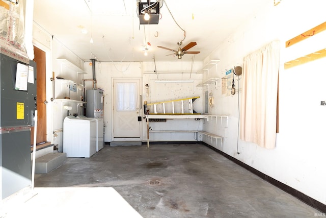 garage with a garage door opener and washing machine and clothes dryer