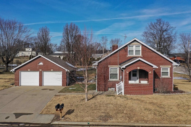 front of property with a garage and a front yard