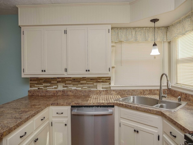 kitchen with white cabinetry, decorative light fixtures, dishwasher, and sink