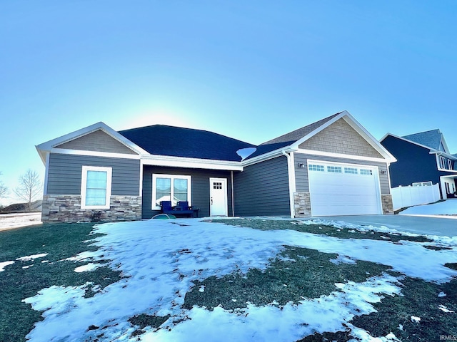 craftsman-style home featuring a garage