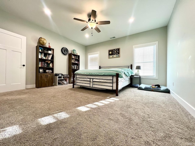 carpeted bedroom featuring ceiling fan