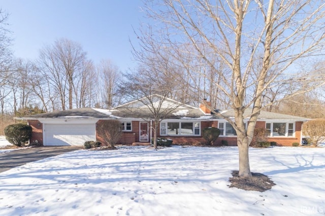 single story home featuring a garage