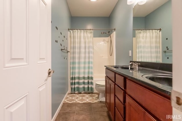 full bathroom featuring vanity, tile patterned floors, toilet, and shower / bathtub combination with curtain