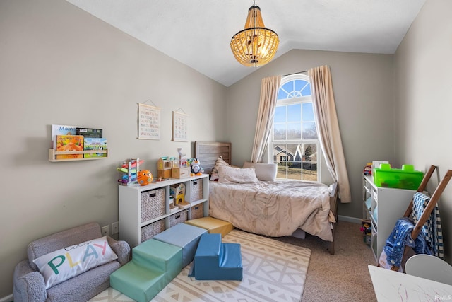 carpeted bedroom with lofted ceiling and a notable chandelier