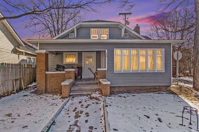 view of snow covered property