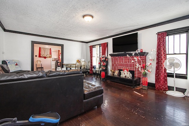 living room with crown molding, wood-type flooring, and a textured ceiling