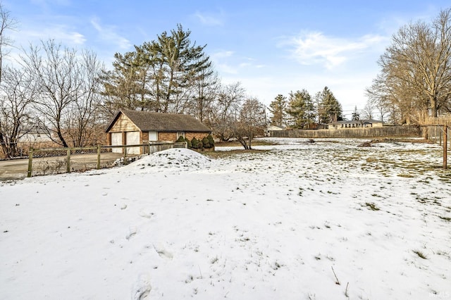 view of yard covered in snow