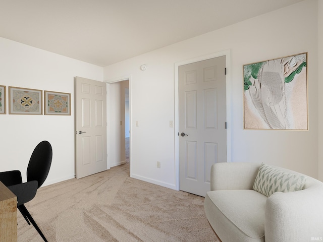 home office featuring light colored carpet