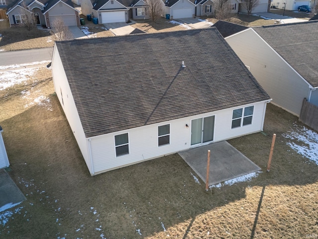 rear view of property featuring a patio area