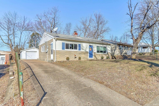 view of front of home with an outbuilding and a garage