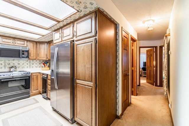 4980 N 300 W, Fremont, IN 46737 - kitchen with range and stainless steel refrigerator with ice dispenser
