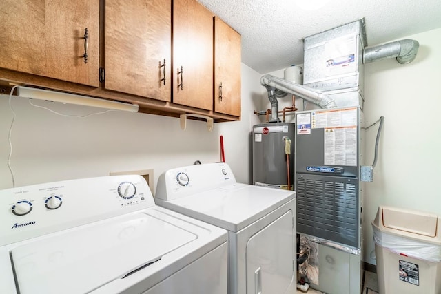 4980 N 300 W, Fremont, IN 46737 - laundry area featuring separate washer and dryer, gas water heater, cabinets, and a textured ceiling