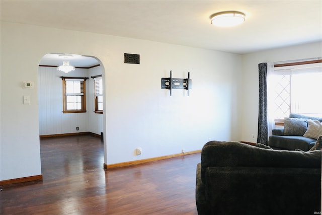 living room featuring dark hardwood / wood-style floors