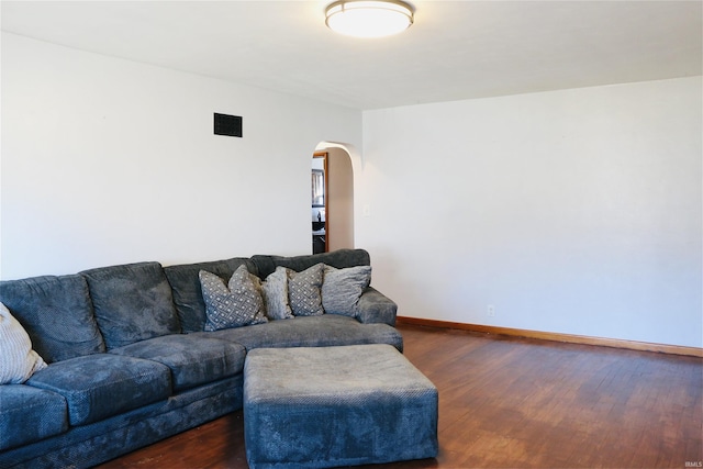 living room with dark wood-type flooring