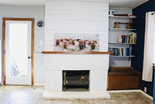 details with a fireplace and ornamental molding