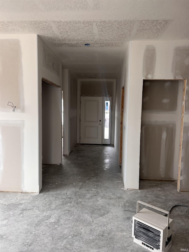 corridor with concrete floors