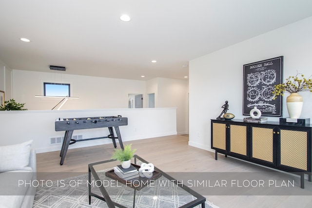 interior space with hardwood / wood-style floors