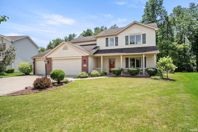 front of property with a porch, a garage, and a front yard