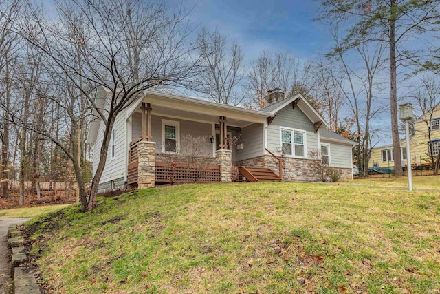 view of front facade with a porch and a front yard