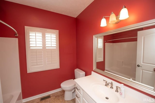 full bathroom with vanity, tub / shower combination, toilet, and a healthy amount of sunlight