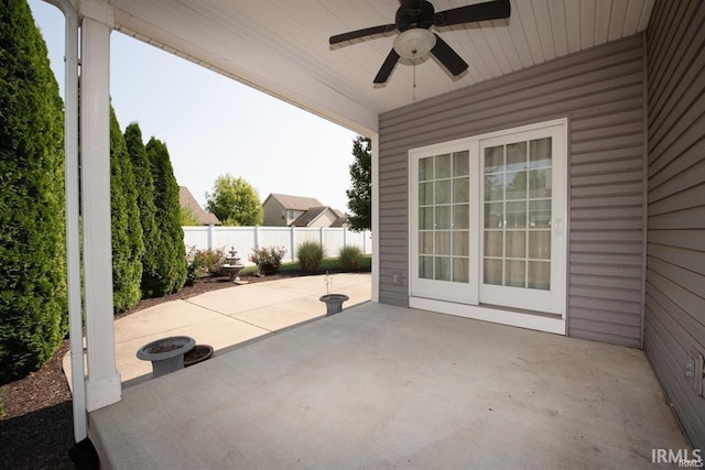 view of patio featuring ceiling fan