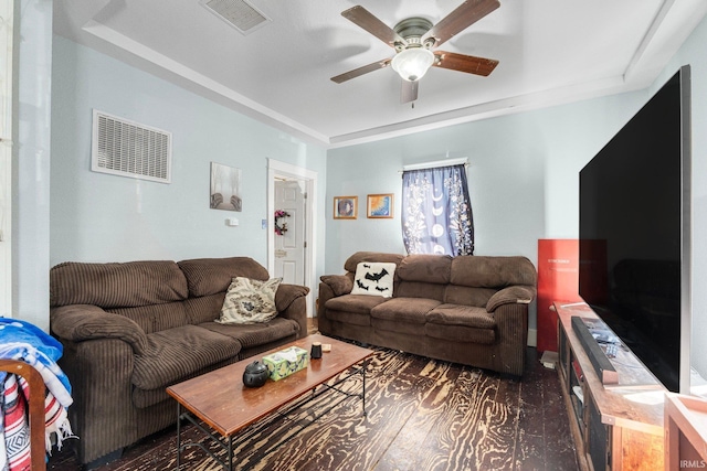 living room featuring dark hardwood / wood-style floors and ceiling fan