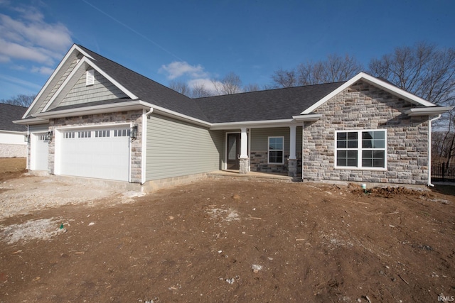 craftsman house featuring a garage and covered porch