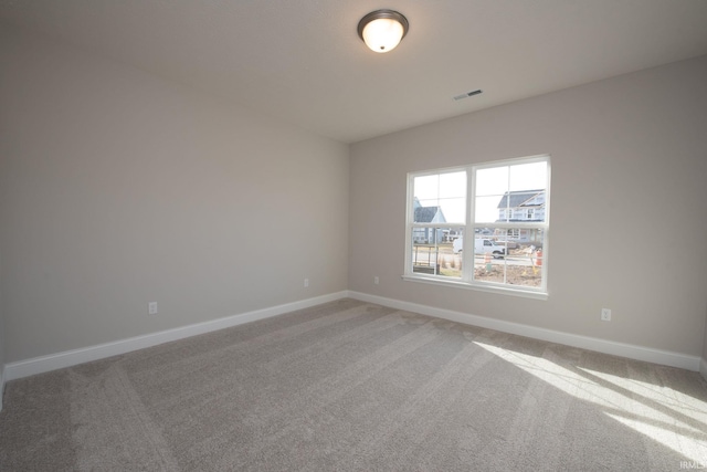 empty room with carpet floors