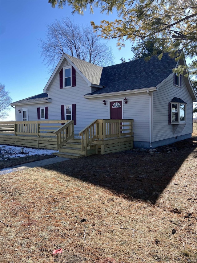 view of front of house featuring a wooden deck