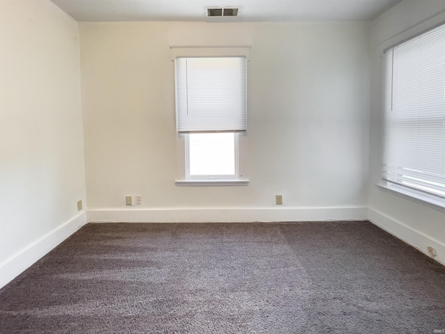 view of carpeted spare room