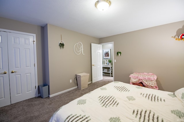 bedroom featuring dark carpet and a closet