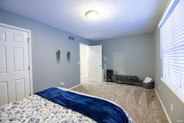 bedroom featuring carpet floors