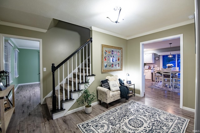 interior space featuring ornamental molding and wood-type flooring