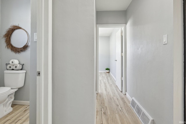 hall featuring light hardwood / wood-style floors